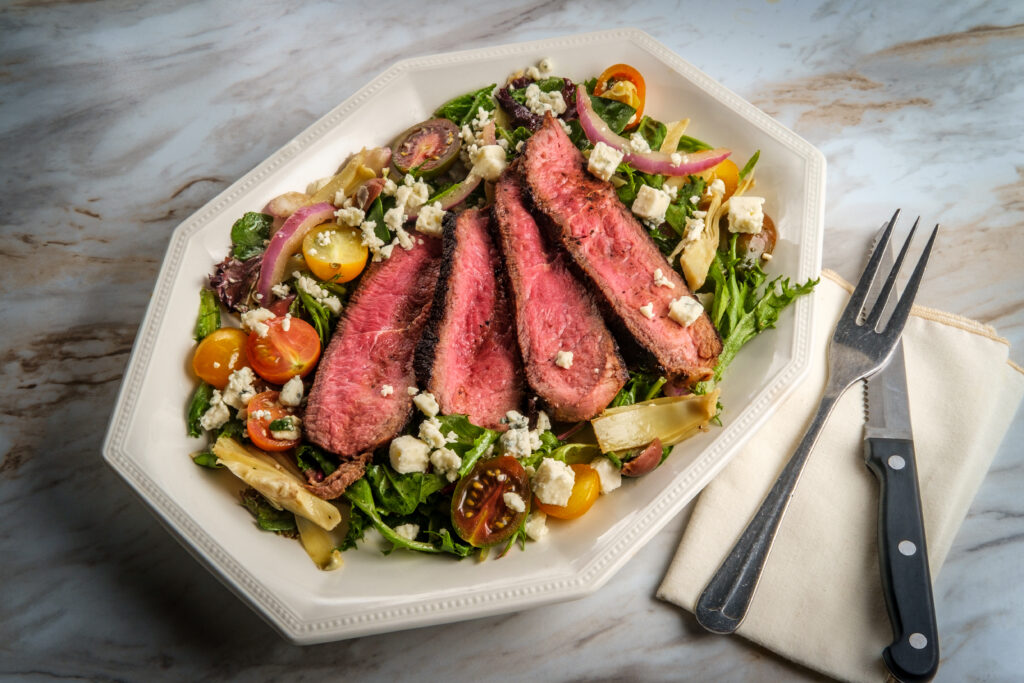 blue,cheese,steak,salad,cooked,rare,with,kalamata,olives,and